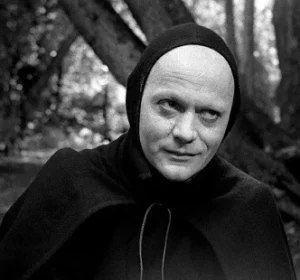 Death, as portrayed in Bergman's The Seventh Seal, wryly smiles